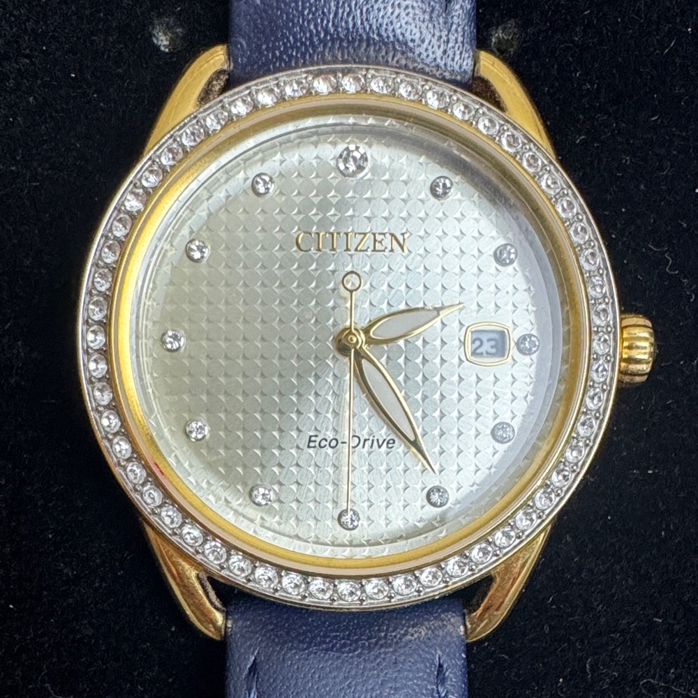Citizen Eco Drive Eco Drive J810-S111871 Gold Tone Watch Crystal Bezel Blue